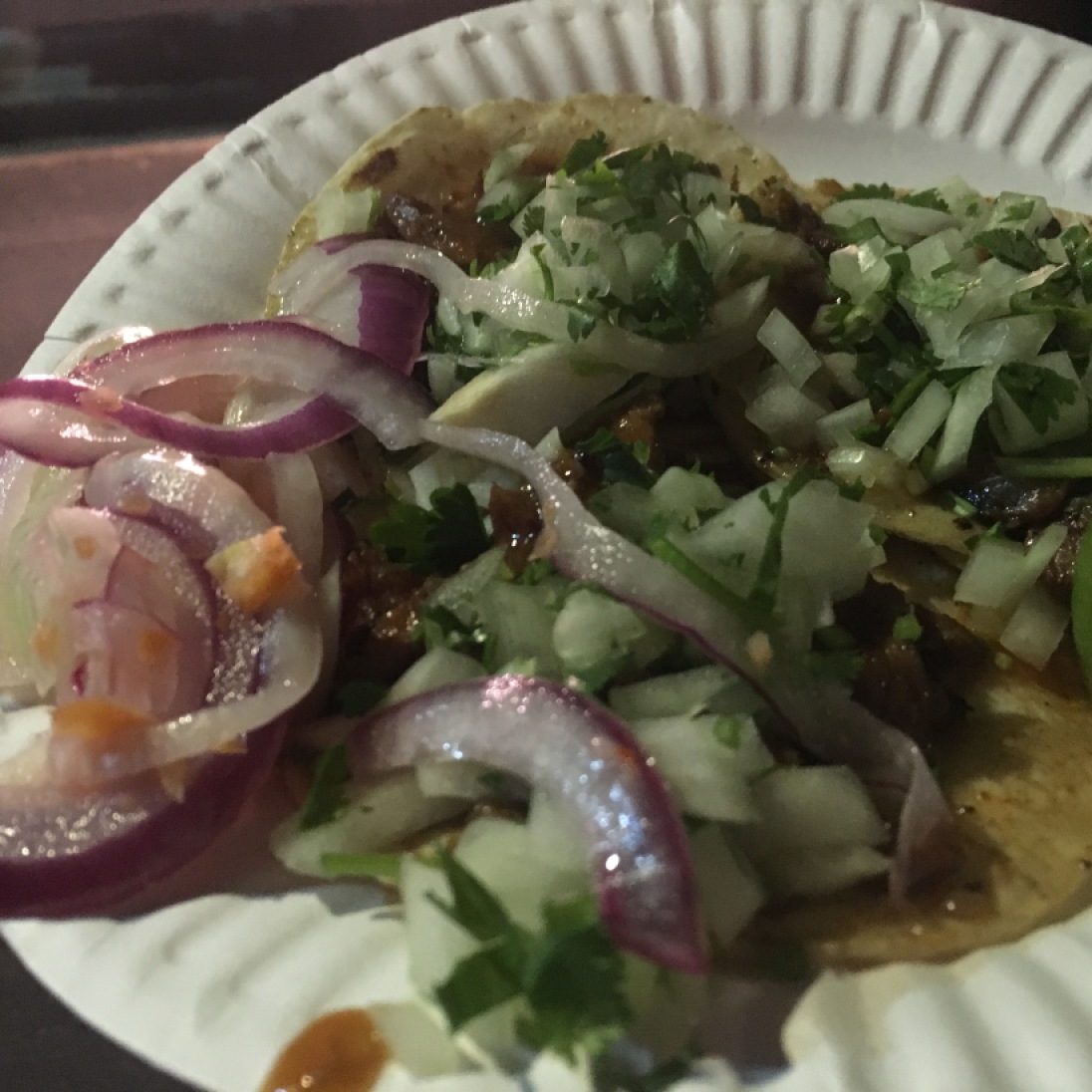 Al Pastor tacos are a speciality of Avenue 26. Tacos normally come with just meat and tortilla, additions are found further down the line of the stand.